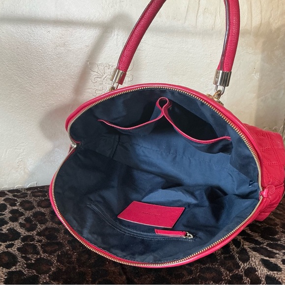 Cole Haan red quilted dome satchel.